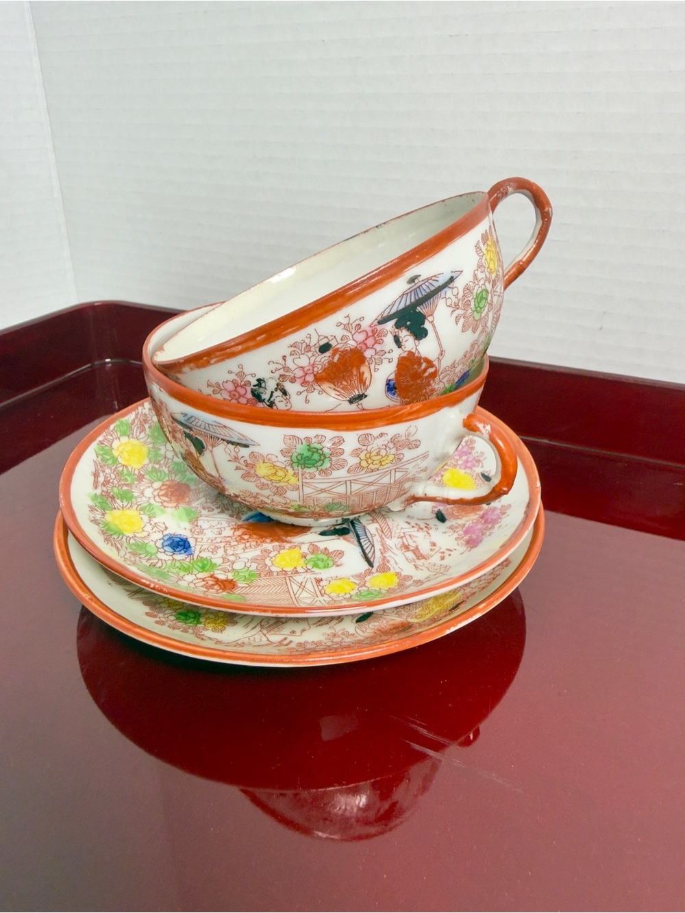 Vintage Floral Porcelain Teacup and Saucer Set - Orange Accent